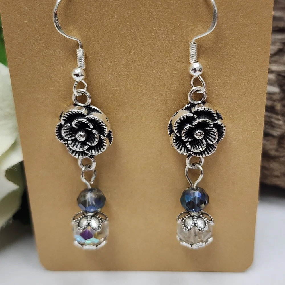 Hand Crafted Dangle Earrings With AB Crystals And Silver Toned Flowers - Picture 2 of 7